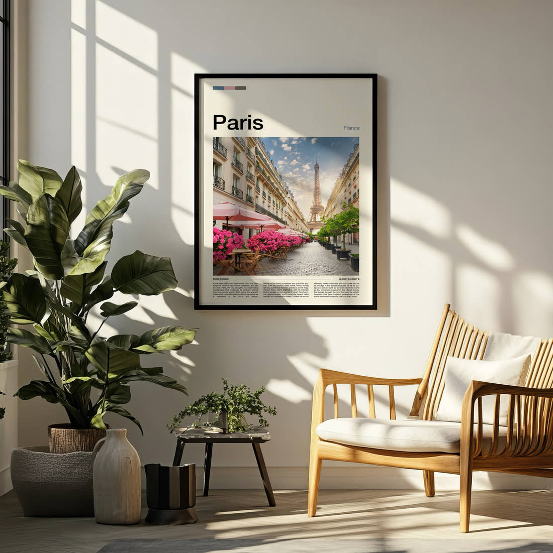 Paris Eiffel Tower And Blossom Travel Print framed on a pale wall beside houseplants