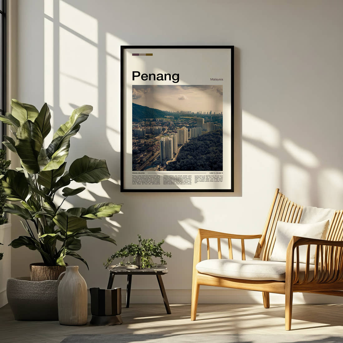 Penang Aerial View Of City Travel Print framed on a pale wall beside houseplants