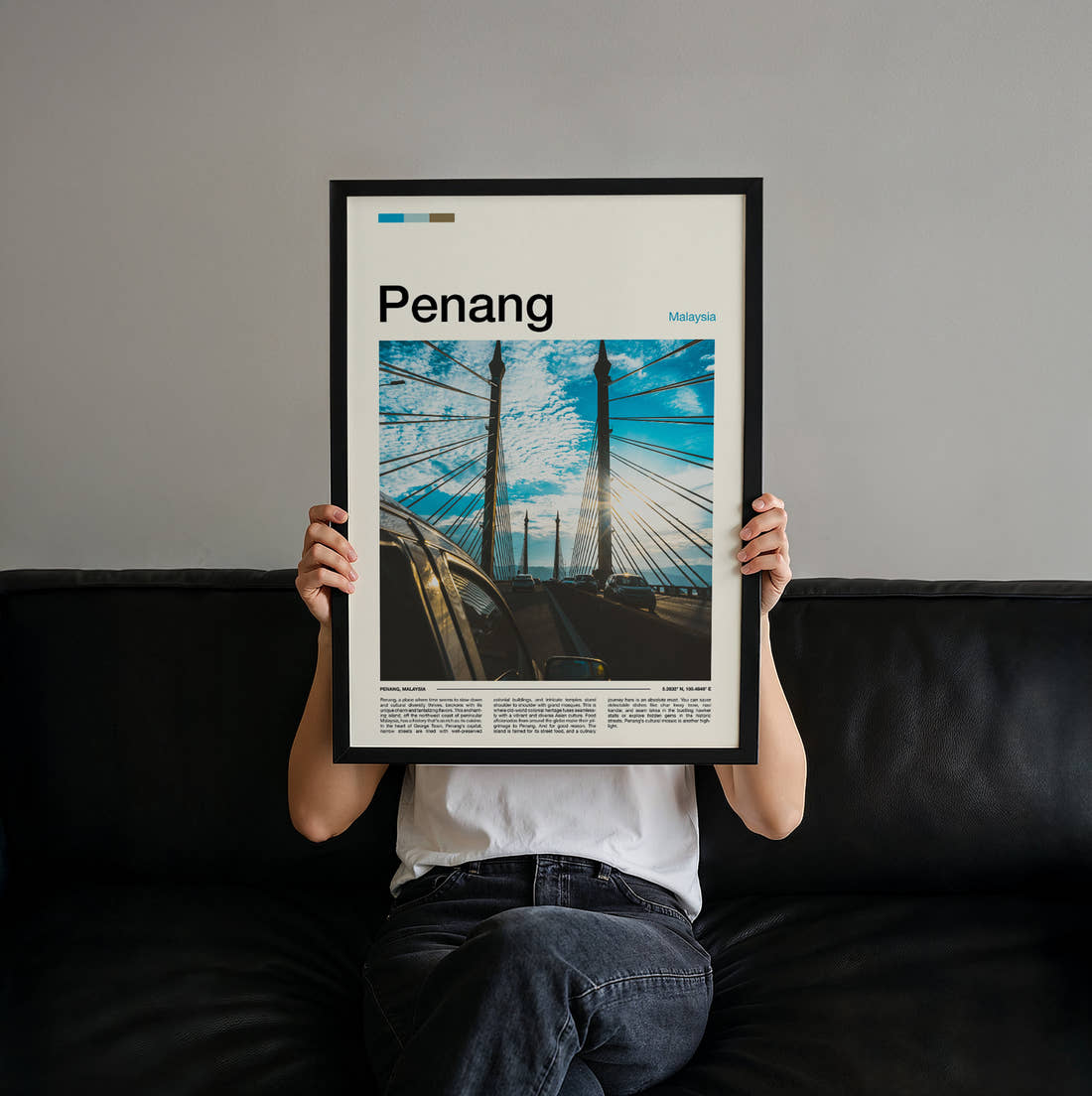 Penang Cable-Stayed Bridge Travel Print held up by hand to show the size of the print