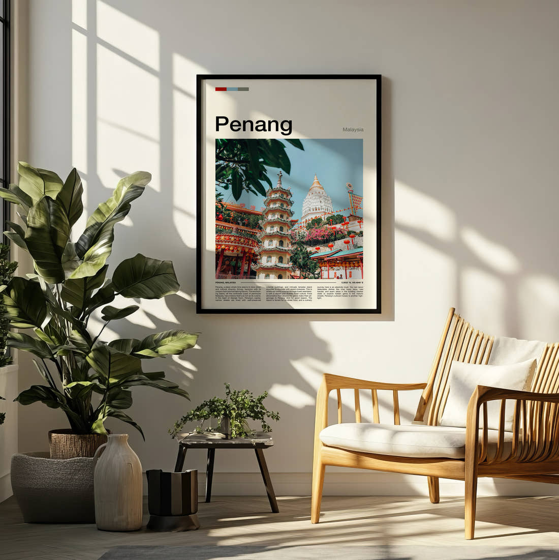 Penang Pagoda And Temple Travel Print framed on a pale wall beside houseplants