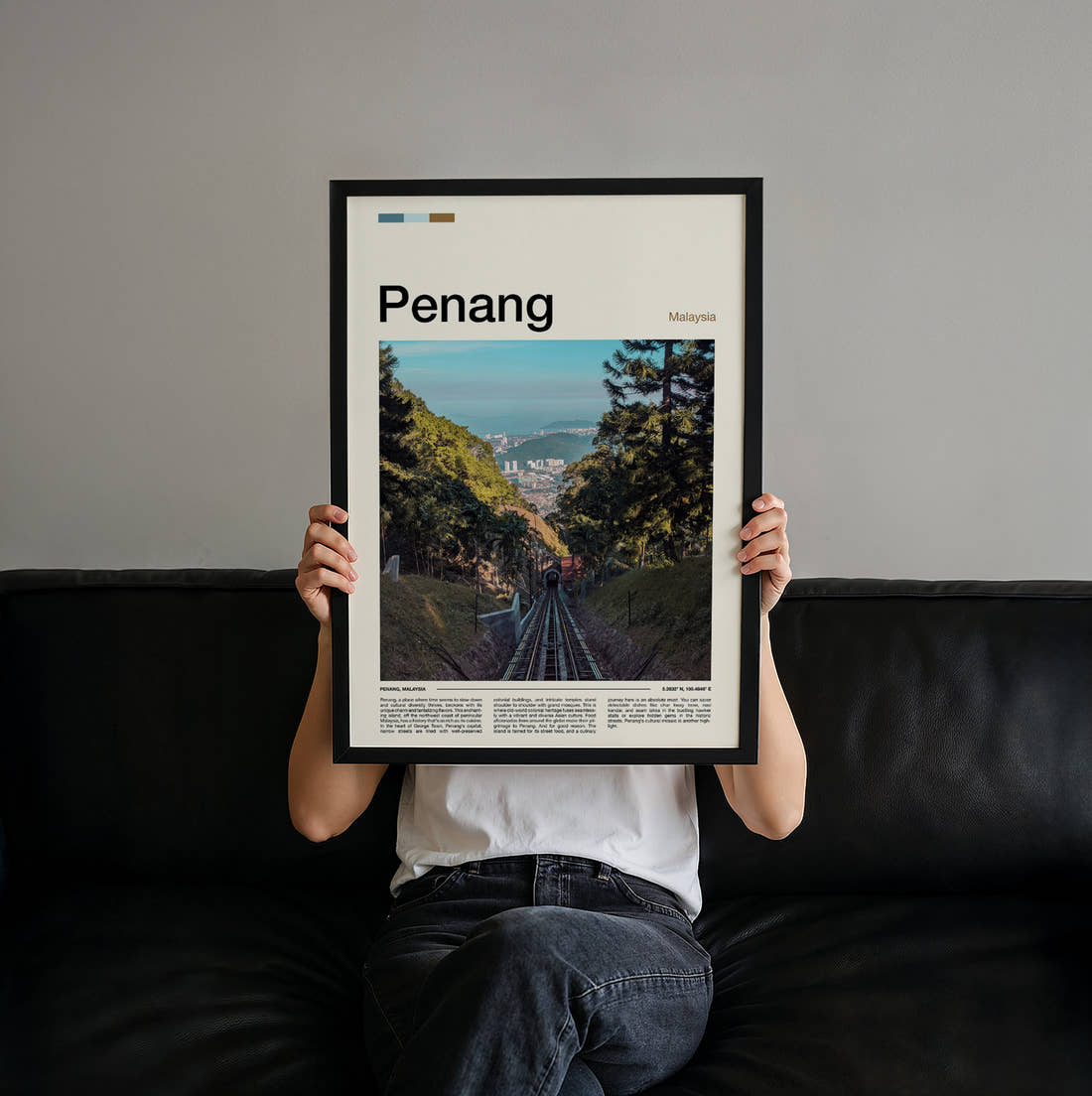 Penang Funicular Railway Travel Print held up by hand to show the size of the print
