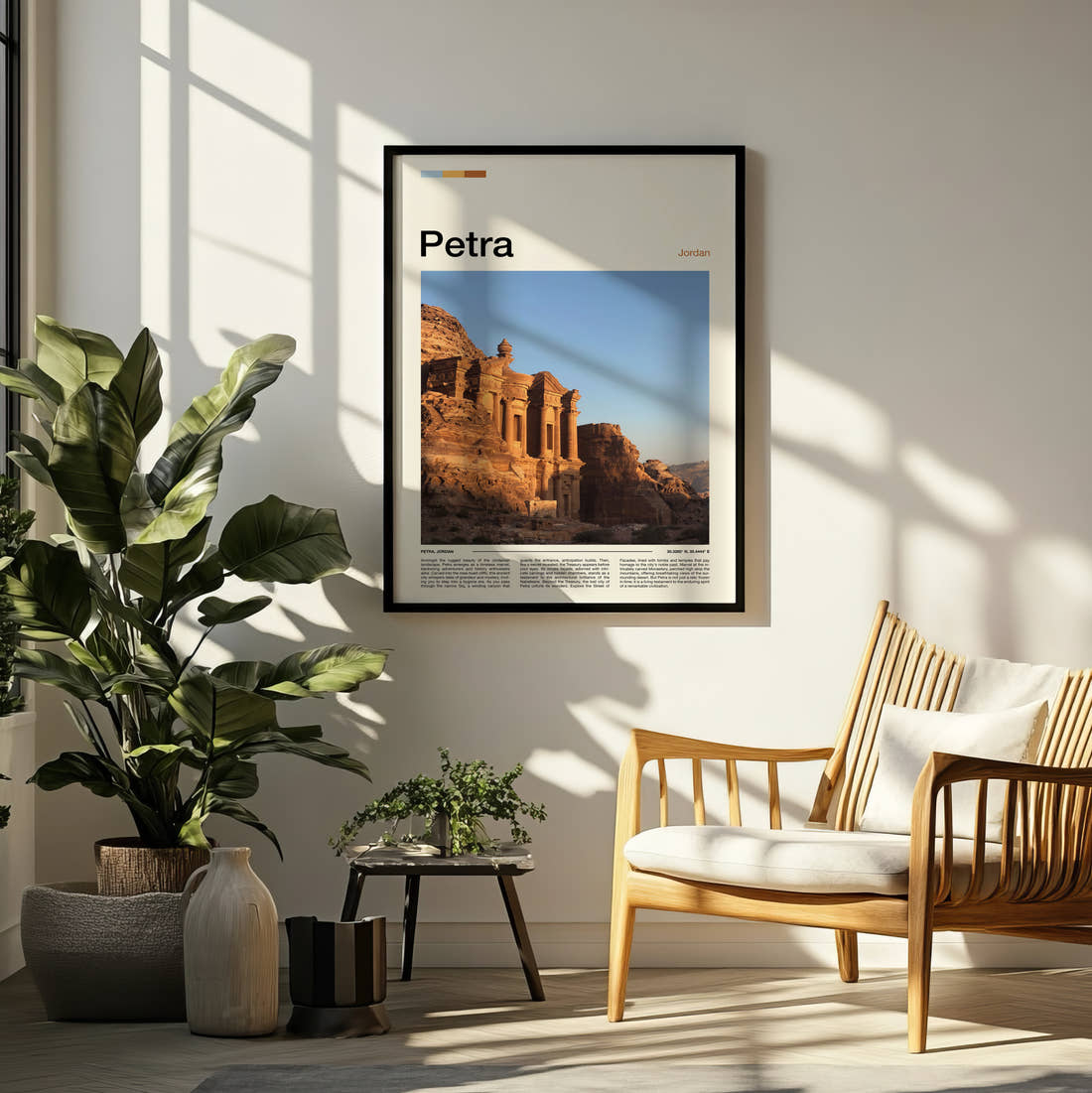 Petra The Monastery Travel Print framed on a pale wall beside houseplants