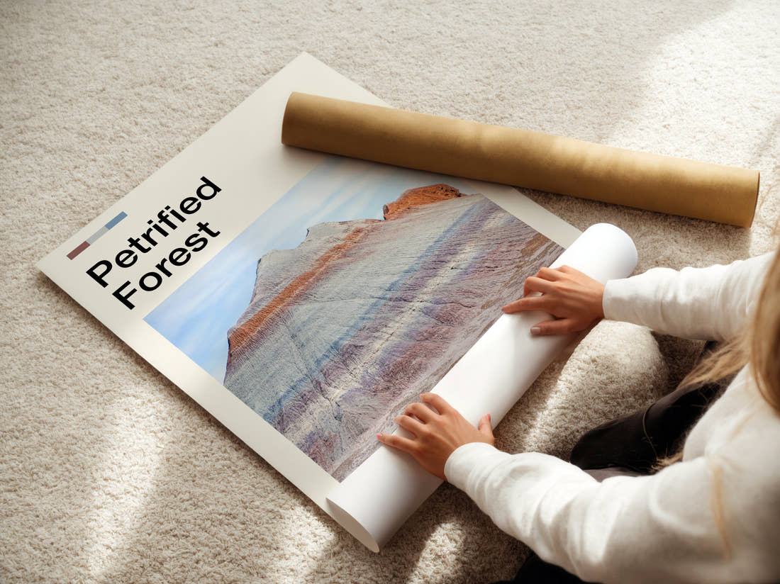 Petrified Forest Striped Badlands Hill Travel Print being unrolled from its postal tube