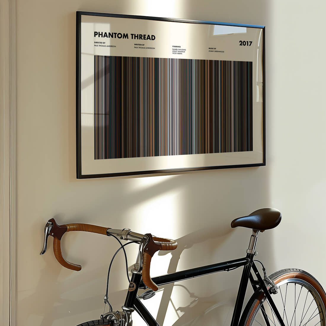 Phantom Thread Movie Barcode Poster framed on the wall of a styled room setting
