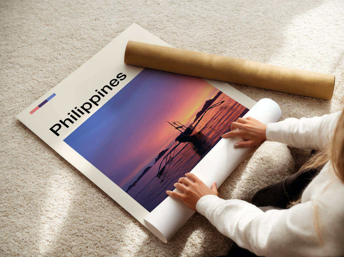 Philippines Outrigger Boat At Sunset Travel Print being unrolled from its postal tube