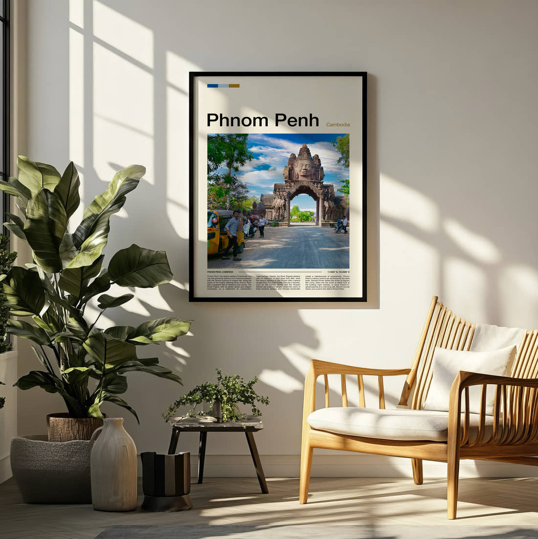 Phnom Penh Temple Gateway Travel Print framed on a pale wall beside houseplants