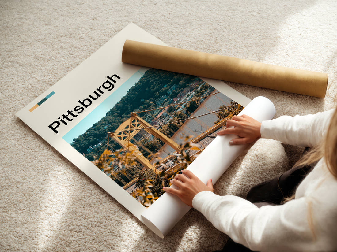 Pittsburgh Yellow Suspension Bridge Travel Print being unrolled from its postal tube