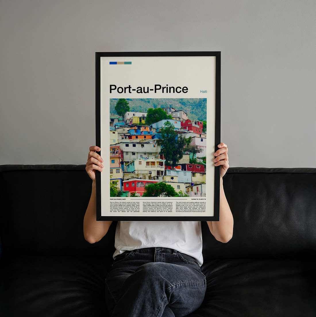 Port Au Prince Colourful Hillside Houses Travel Print held up by hand to show the size of the print
