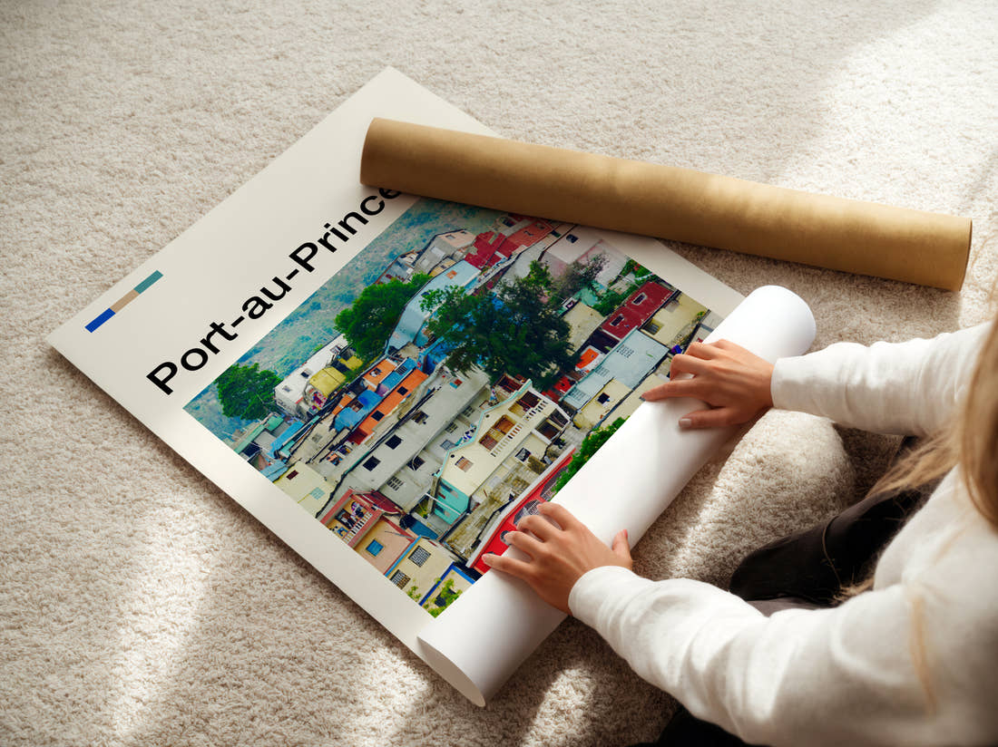 Port Au Prince Colourful Hillside Houses Travel Print being unrolled from its postal tube