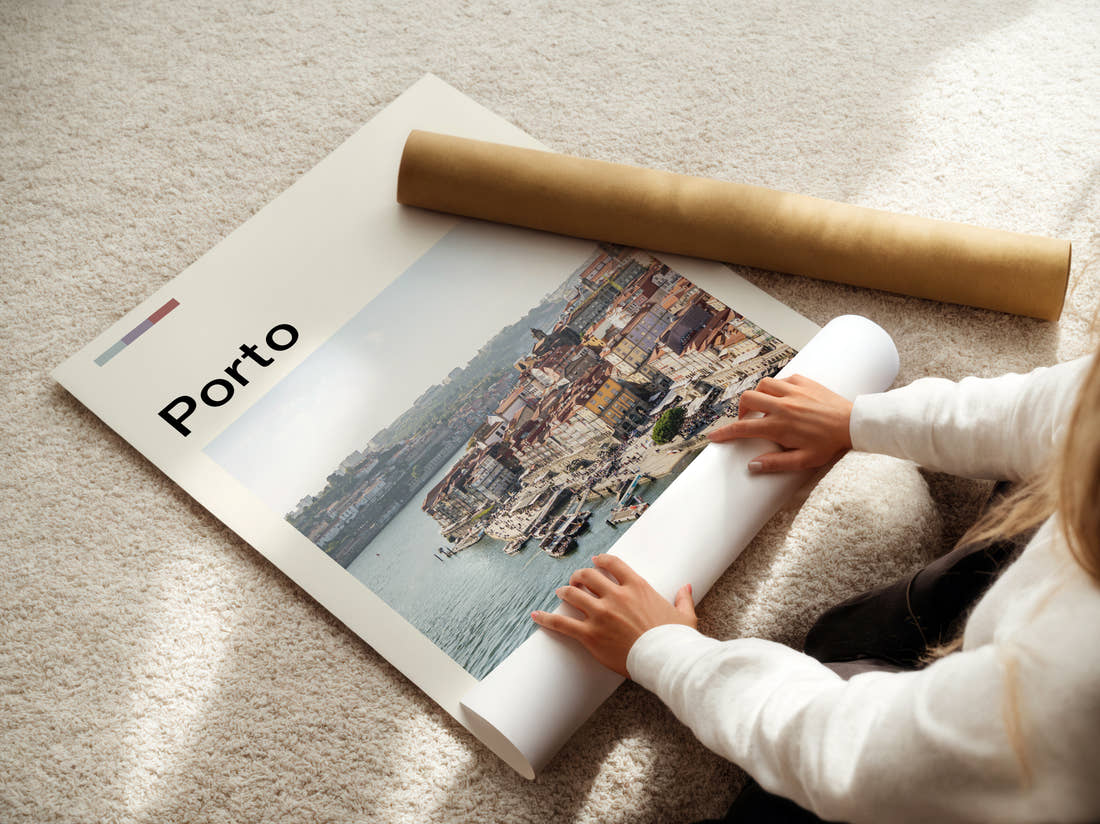 Porto Riverside Houses Travel Print being unrolled from its postal tube