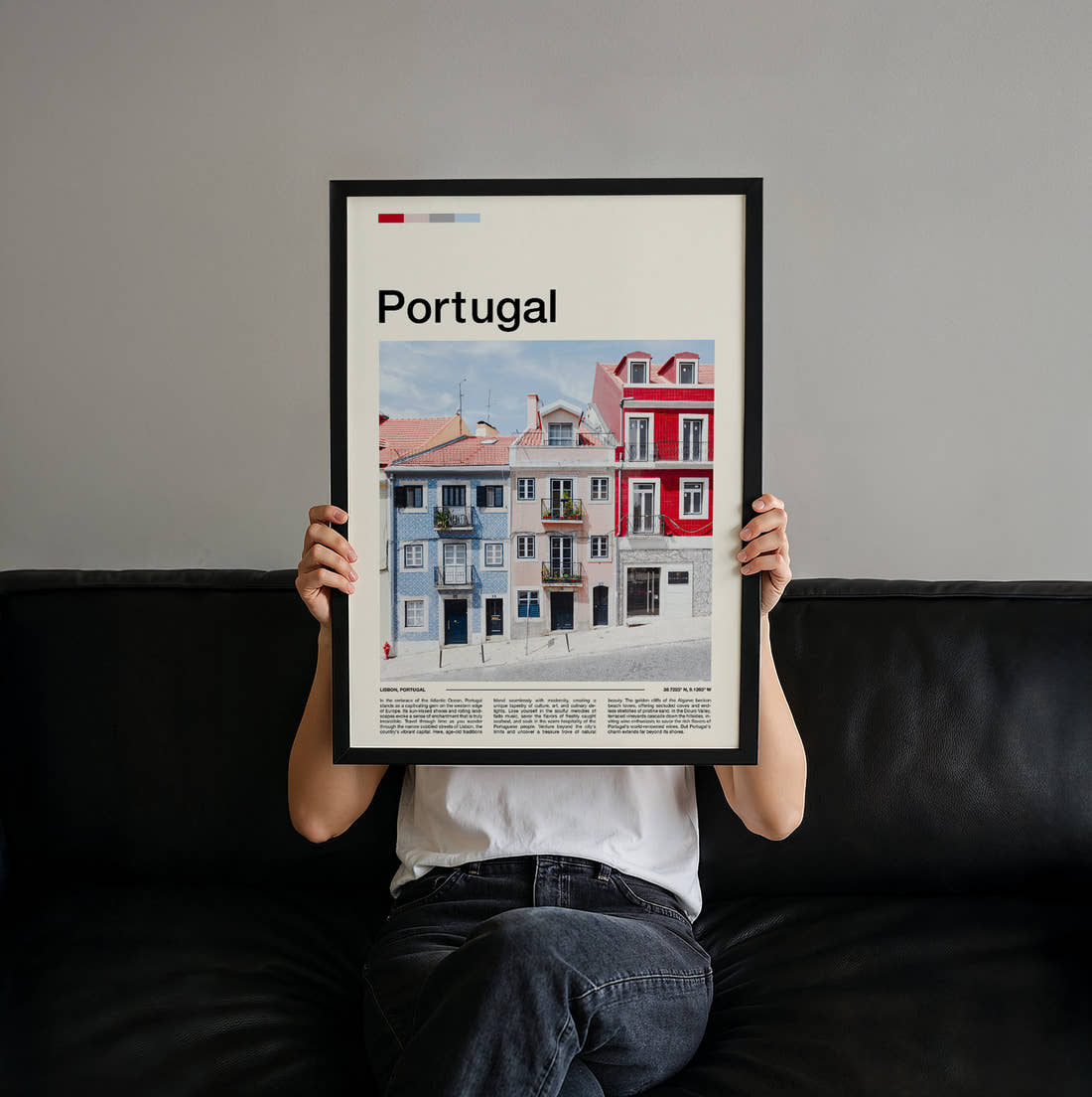 Portugal Colourful Townhouses Travel Print held up by hand to show the size of the print