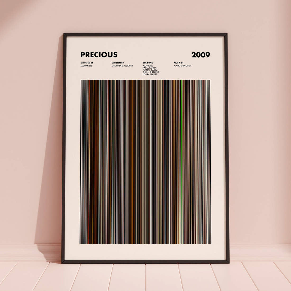 Precious Movie Barcode Poster framed and leaning against a coloured wall
