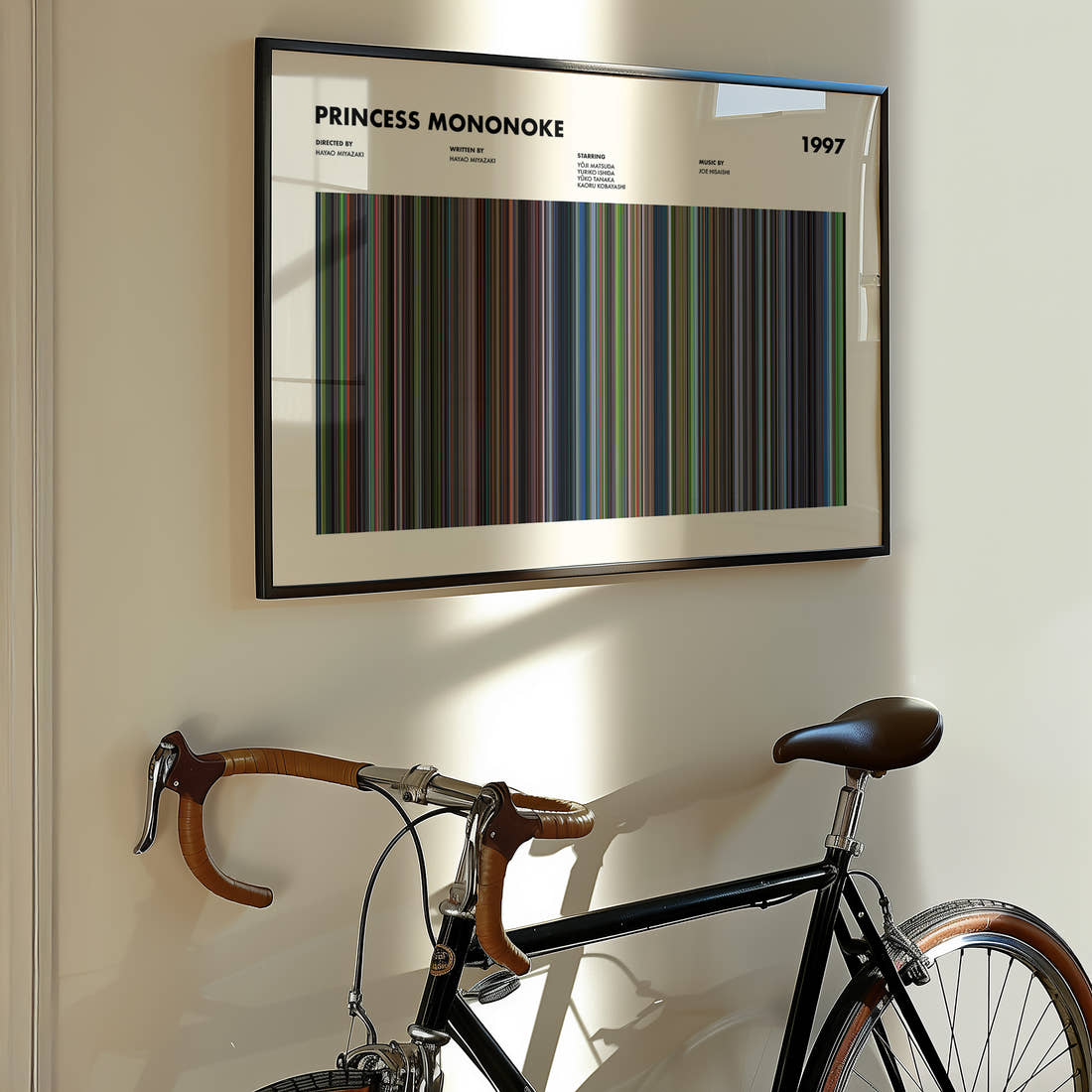 Princess Mononoke Movie Barcode Poster framed on the wall of a styled room setting