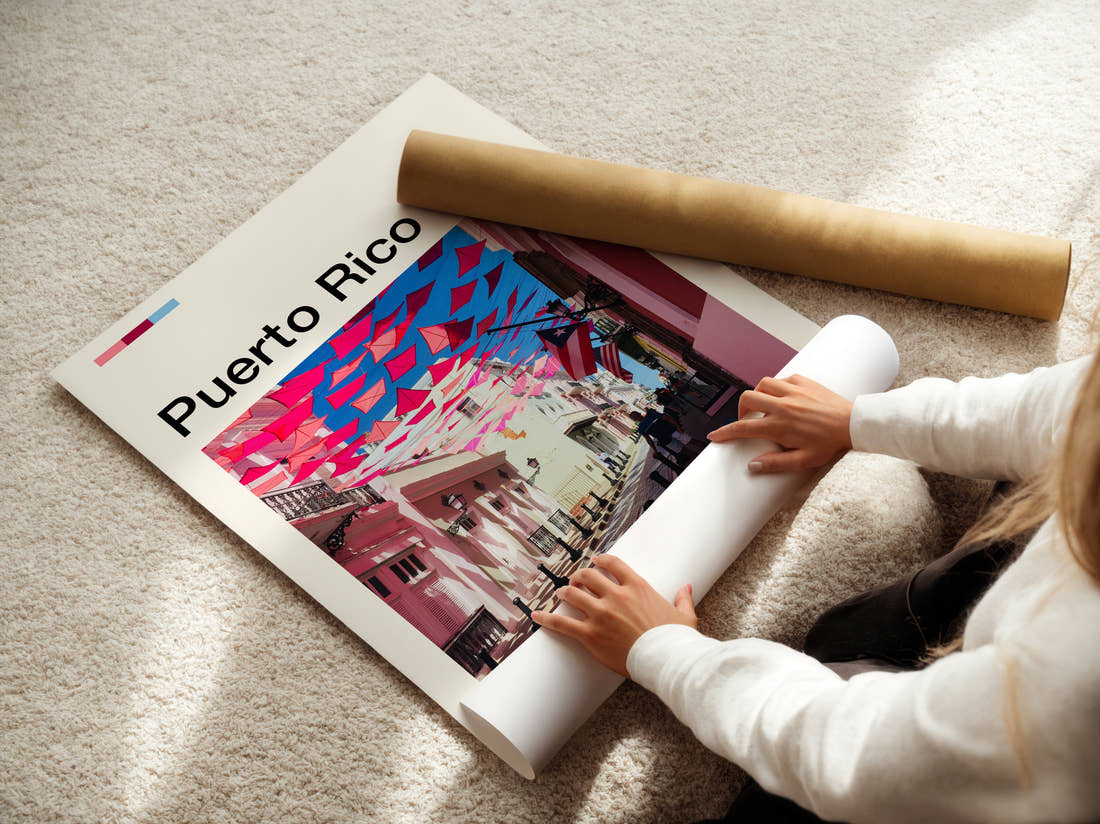 Puerto Rico Pink Street With Bunting Travel Print being unrolled from its postal tube