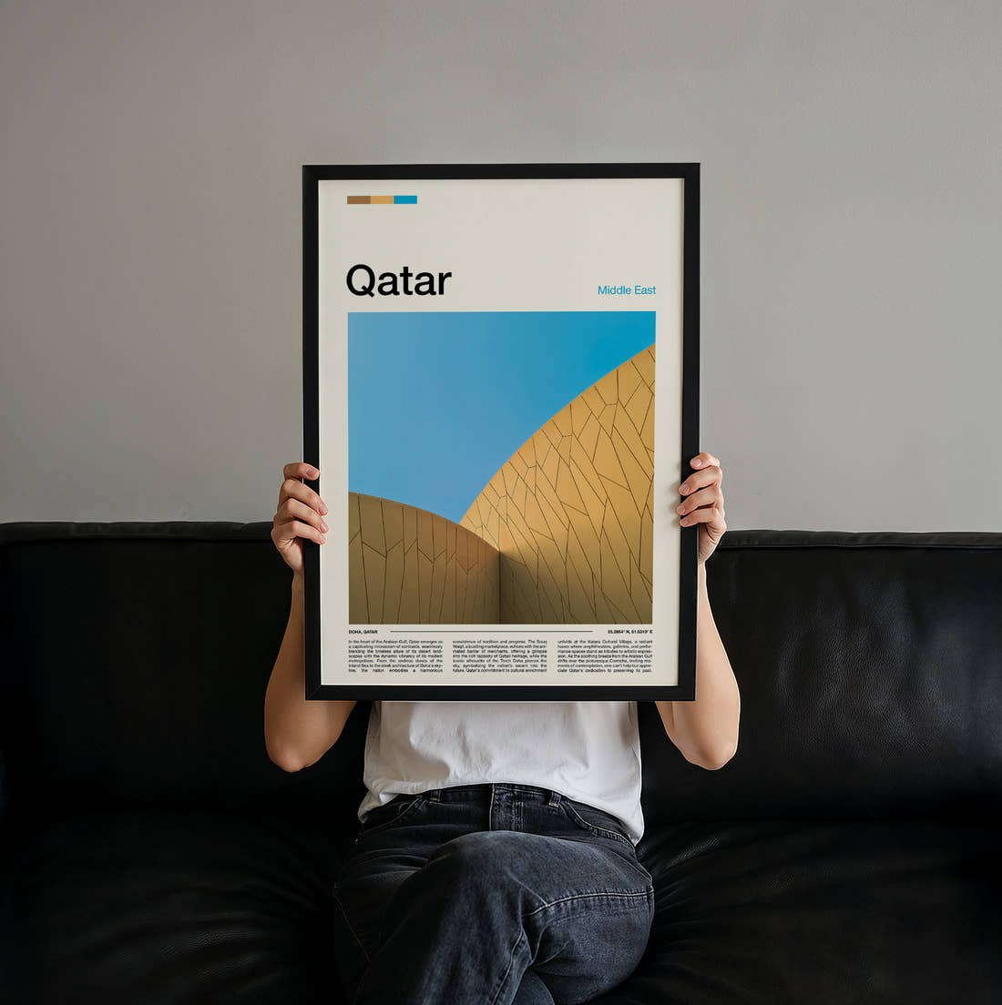 Qatar Curved Golden Facade Travel Print held up by hand to show the size of the print