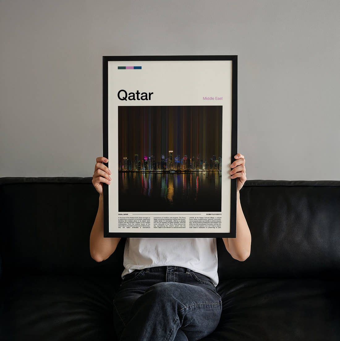 Qatar Skyline Lights Reflected Travel Print held up by hand to show the size of the print