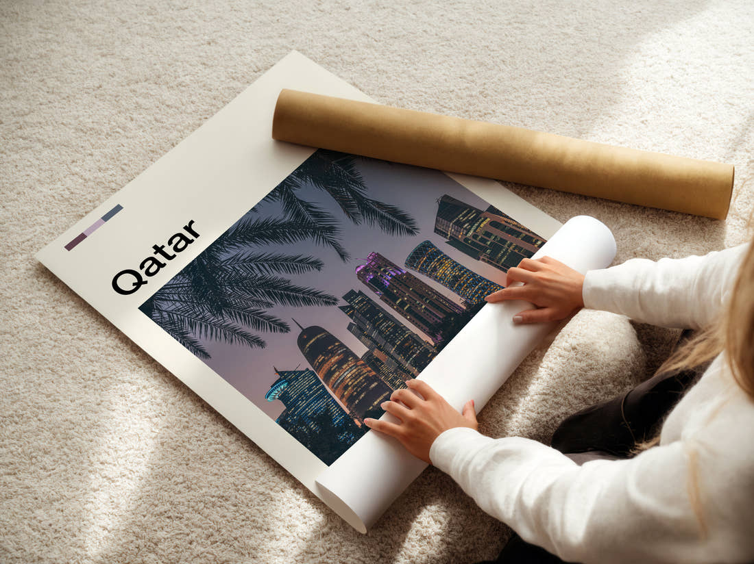 Qatar Skyscrapers And Palm Fronds Travel Print being unrolled from its postal tube