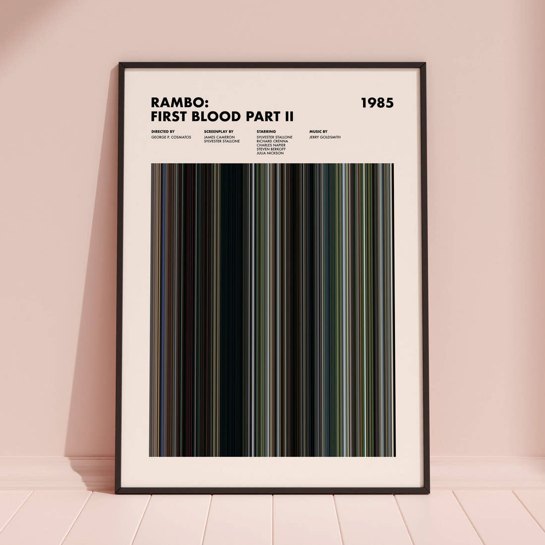 Rambo: First Blood Part II Movie Barcode Poster framed and leaning against a coloured wall