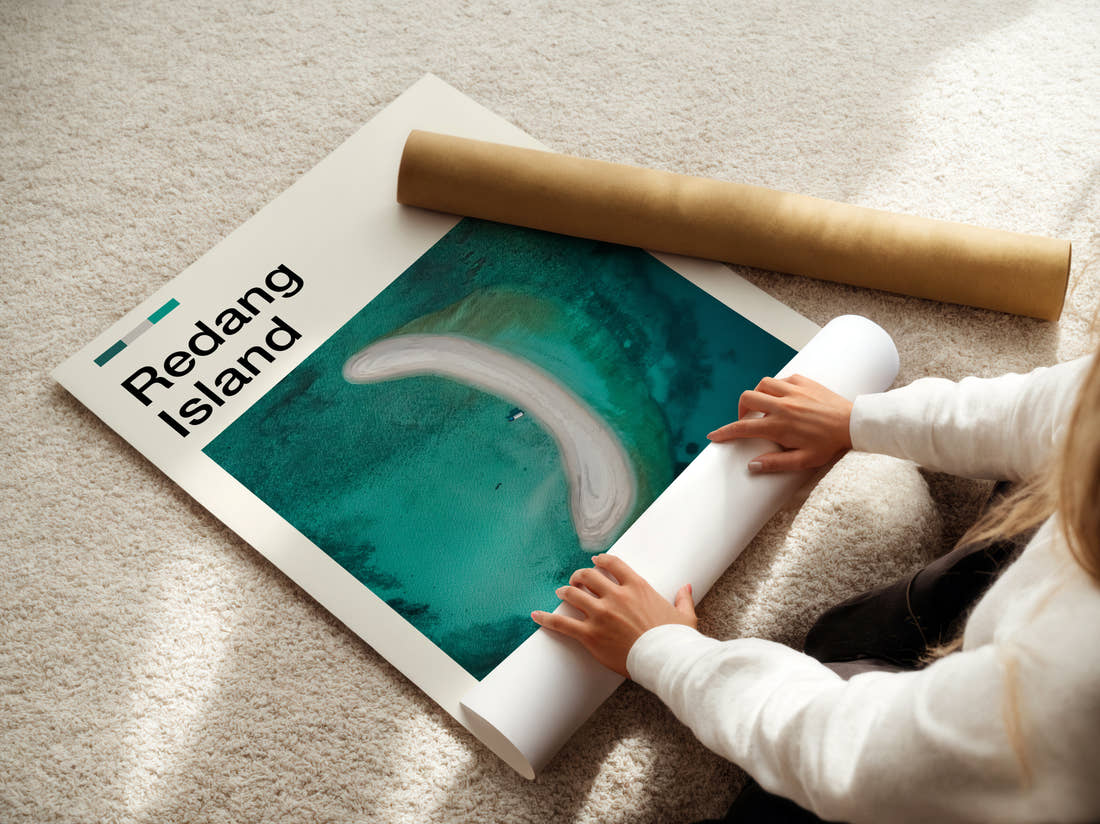 Redang Curved Sandbar From Above Travel Print being unrolled from its postal tube