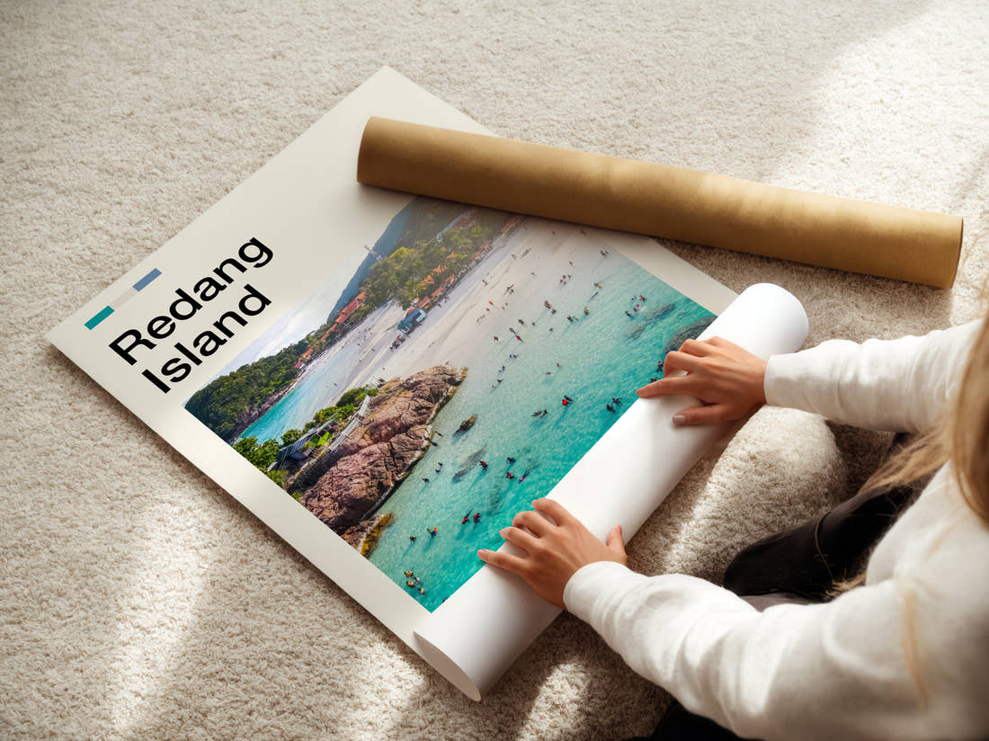 Redang Swimmers In Turquoise Water Travel Print being unrolled from its postal tube