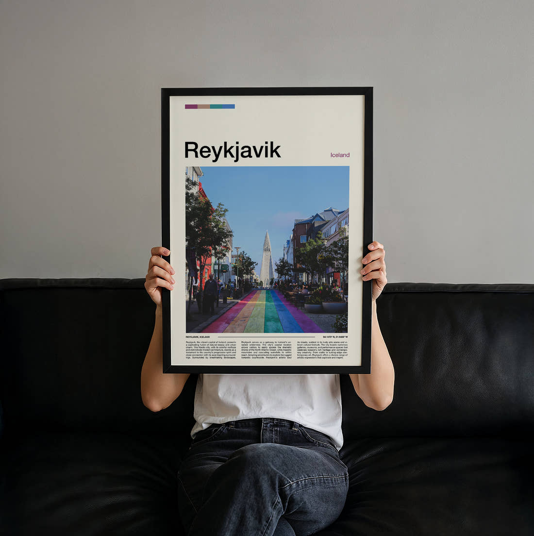 Reykjavik Rainbow Street Travel Print held up by hand to show the size of the print