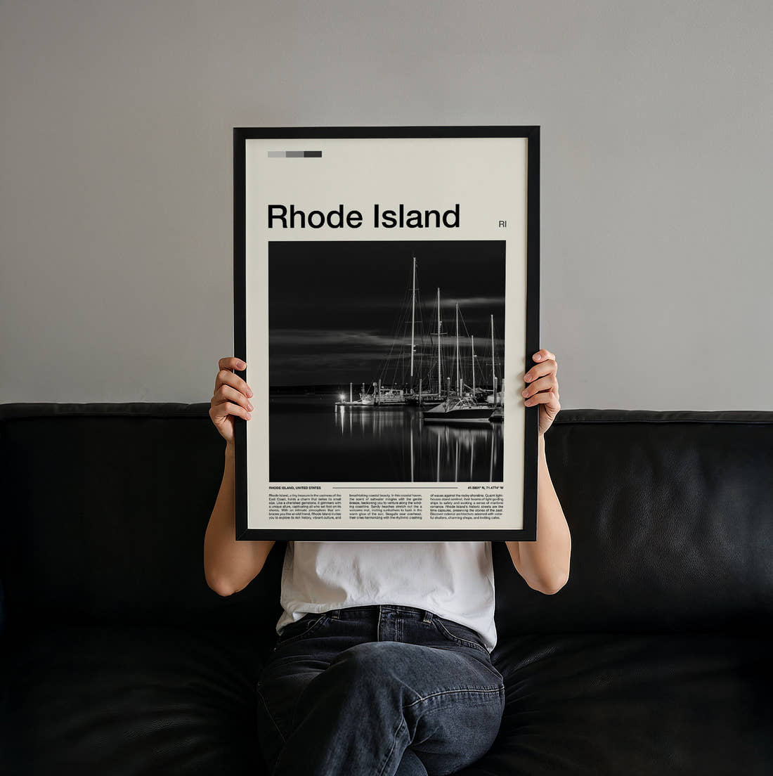 Rhode Island Marina In Black And White Travel Print held up by hand to show the size of the print
