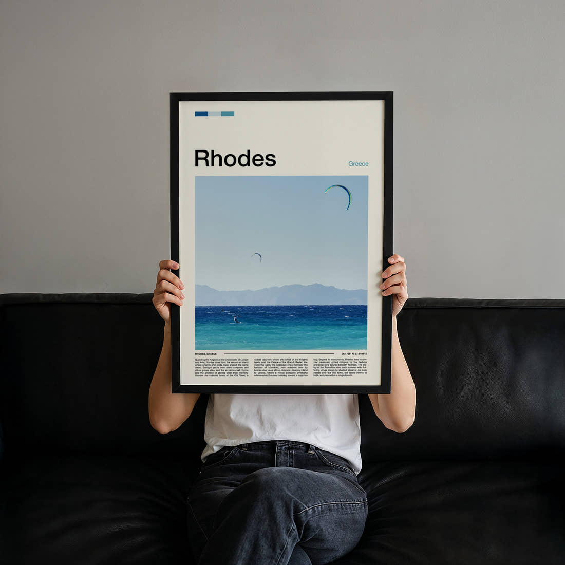 Rhodes Kitesurfers Over Sea Travel Print held up by hand to show the size of the print