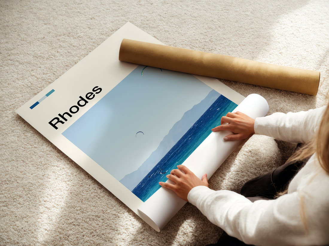 Rhodes Kitesurfers Over Sea Travel Print being unrolled from its postal tube