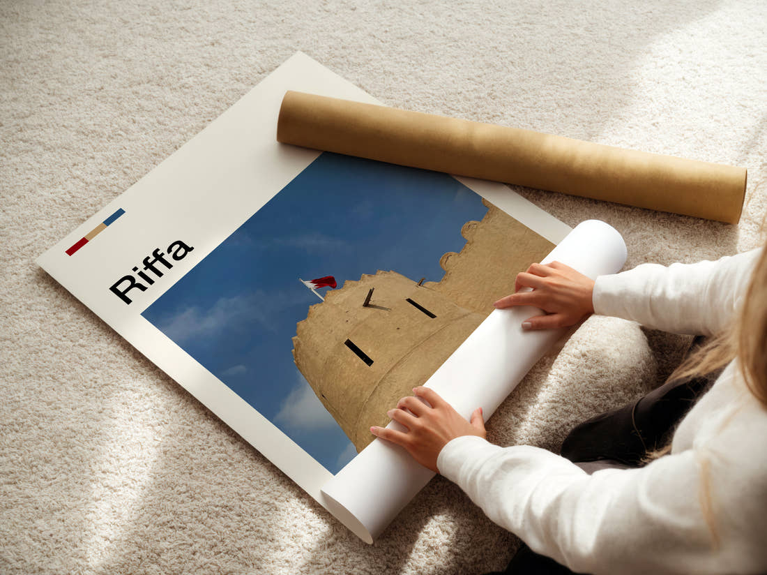 Riffa Fort With Flag Travel Print being unrolled from its postal tube