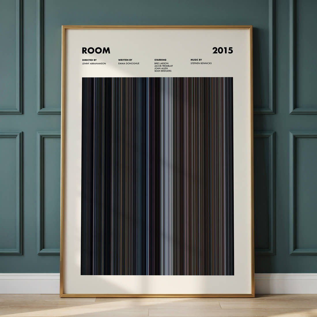 Room Movie Barcode Poster framed and leaning against a panelled wall