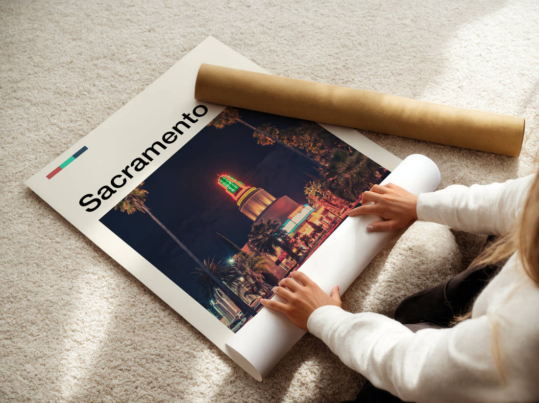 Sacramento Neon Theatre Sign Travel Print being unrolled from its postal tube