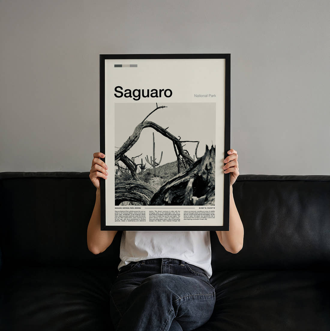 Saguaro Fallen Tree And Cacti Travel Print held up by hand to show the size of the print