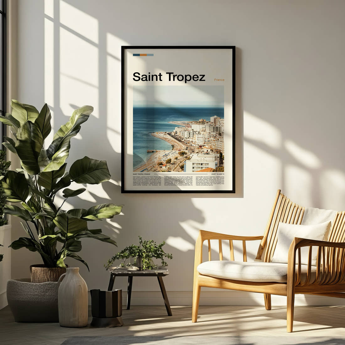 Saint Tropez Aerial Coastal View Travel Print framed on a pale wall beside houseplants