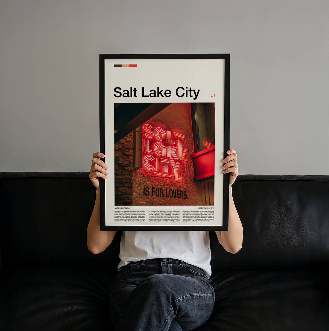 Salt Lake City Neon Sign Travel Print held up by hand to show the size of the print