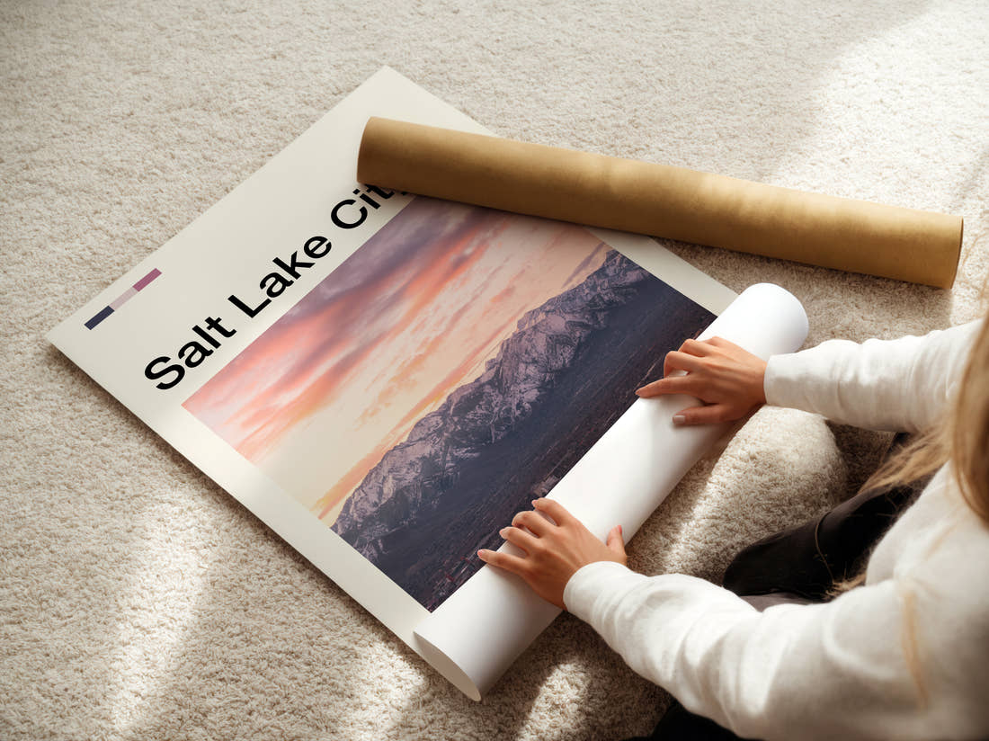Salt Lake City Snowy Mountains At Sunset Travel Print being unrolled from its postal tube