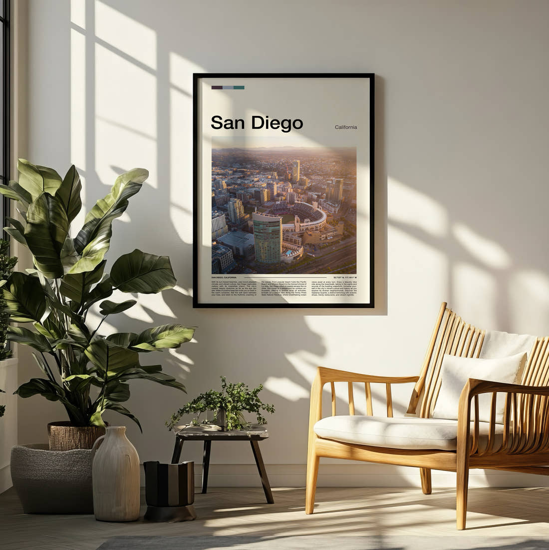 San Diego Aerial City View Travel Print framed on a pale wall beside houseplants