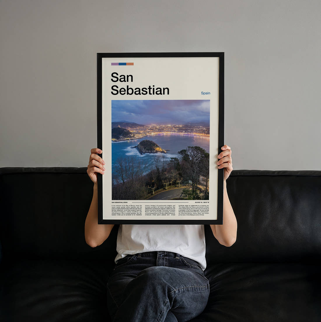 San Sebastian Bay At Dusk Travel Print held up by hand to show the size of the print