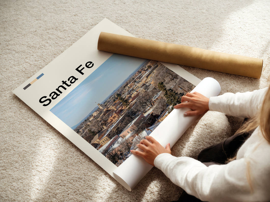 Santa Fe Adobe Townscape Travel Print being unrolled from its postal tube