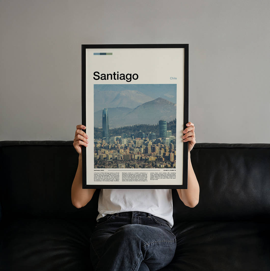 Santiago Skyline With Mountains Travel Print held up by hand to show the size of the print