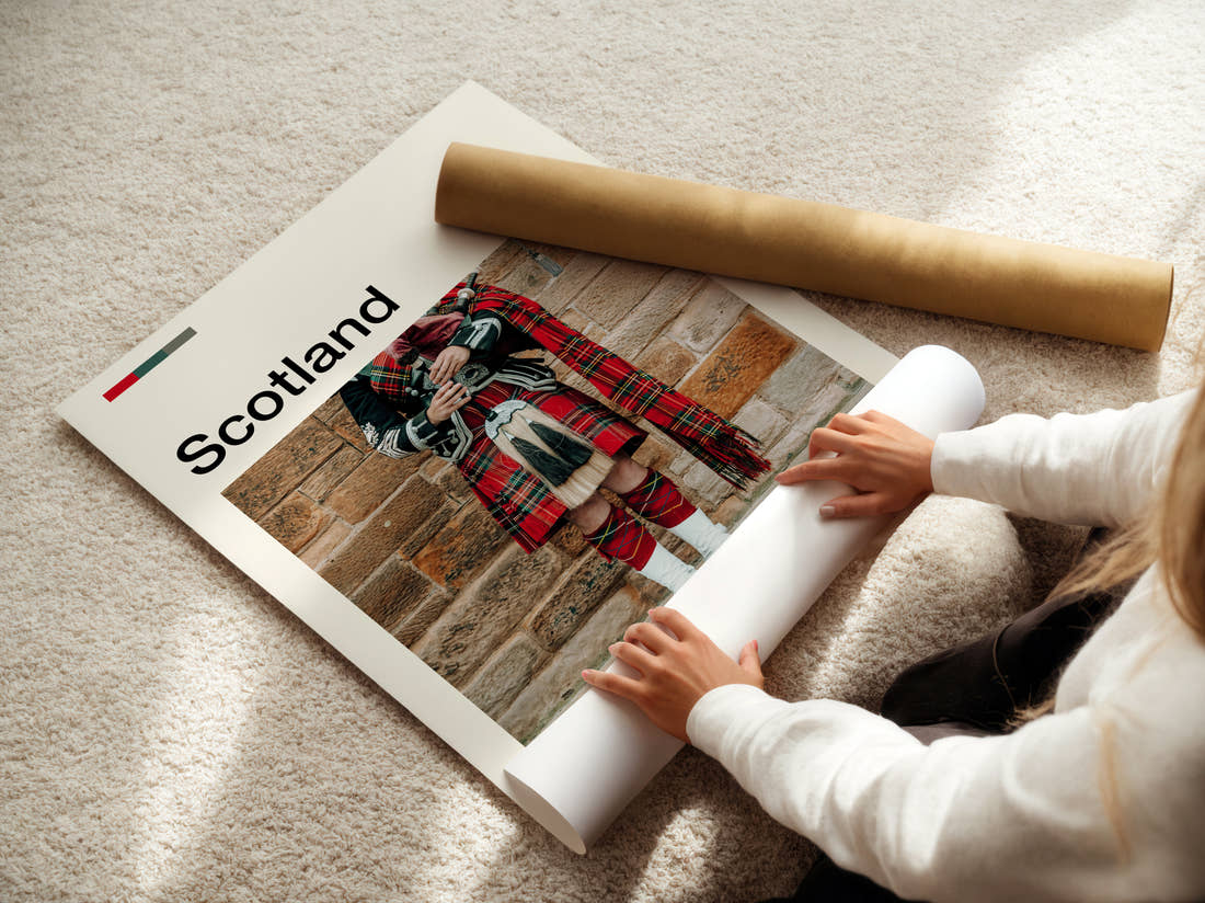 Scotland Bagpiper In Kilt Travel Print being unrolled from its postal tube