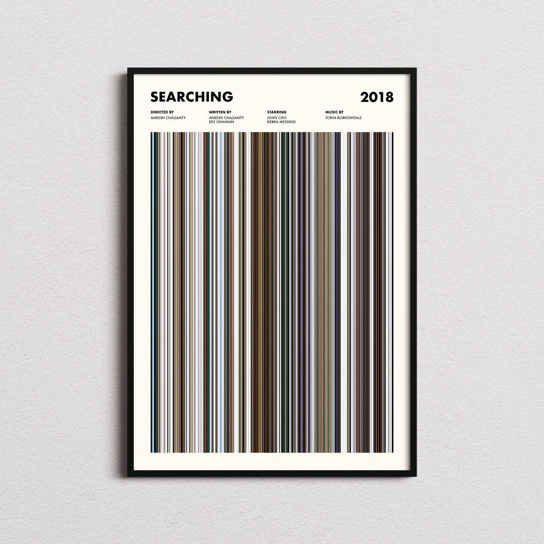 Searching Movie Barcode Poster framed on a plain studio wall