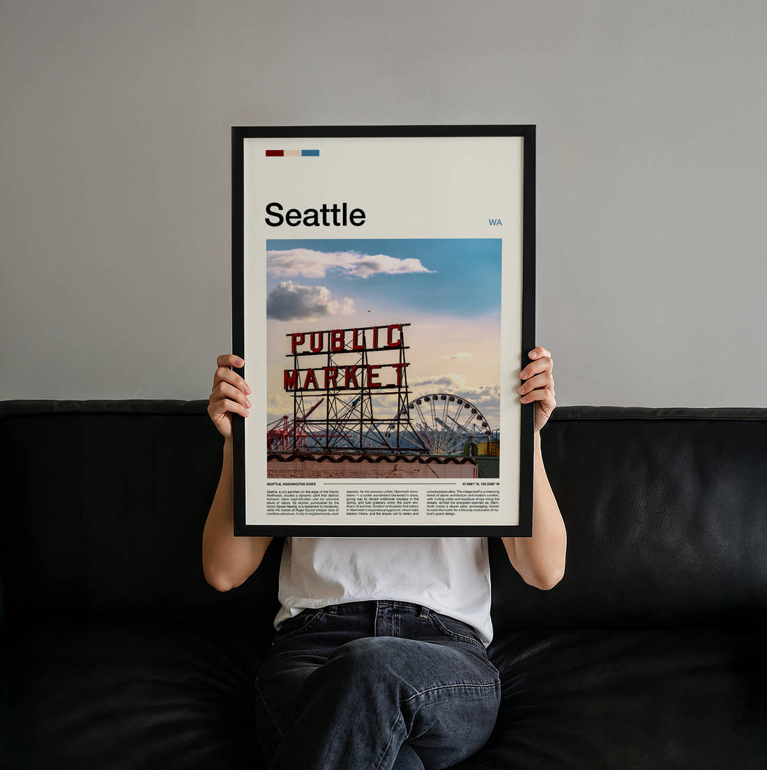 Seattle Public Market Sign And Big Wheel Travel Print held up by hand to show the size of the print