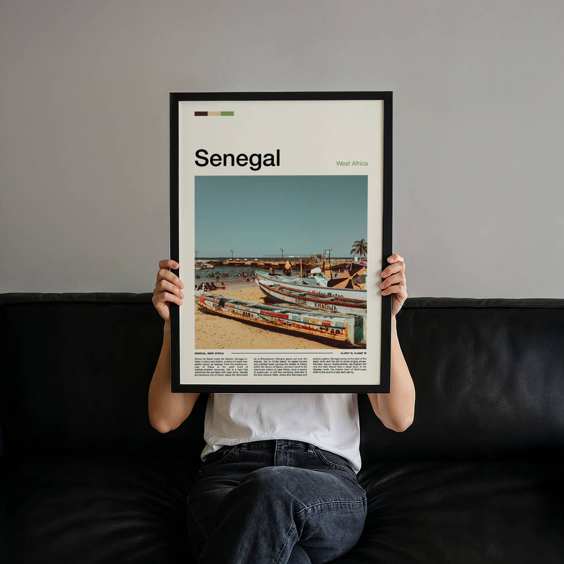 Senegal Weathered Fishing Boats Travel Print held up by hand to show the size of the print