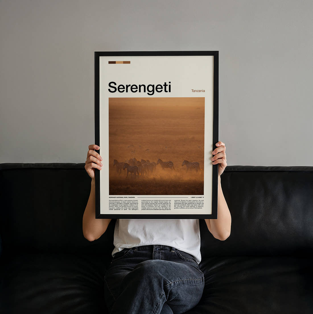 Serengeti Zebras In Dust Travel Print held up by hand to show the size of the print