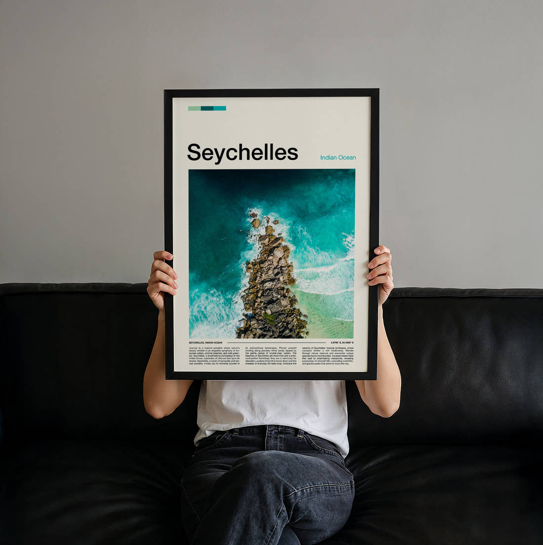 Seychelles Aerial Rocky Shoreline Travel Print held up by hand to show the size of the print