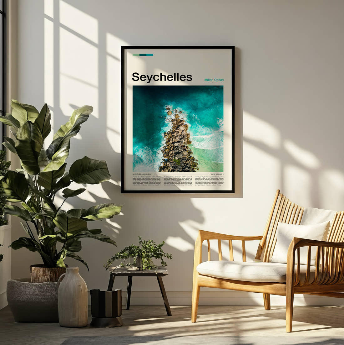 Seychelles Aerial Rocky Shoreline Travel Print framed on a pale wall beside houseplants