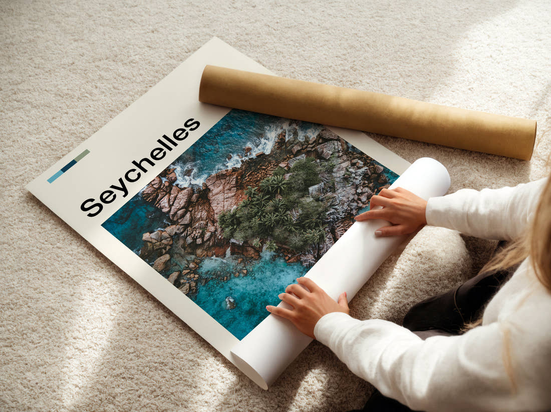 Seychelles Aerial Rocky Coast Travel Print being unrolled from its postal tube