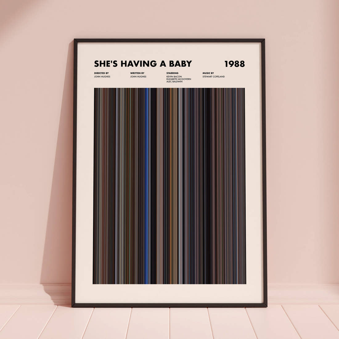 She's Having A Baby Movie Barcode Poster framed and leaning against a coloured wall