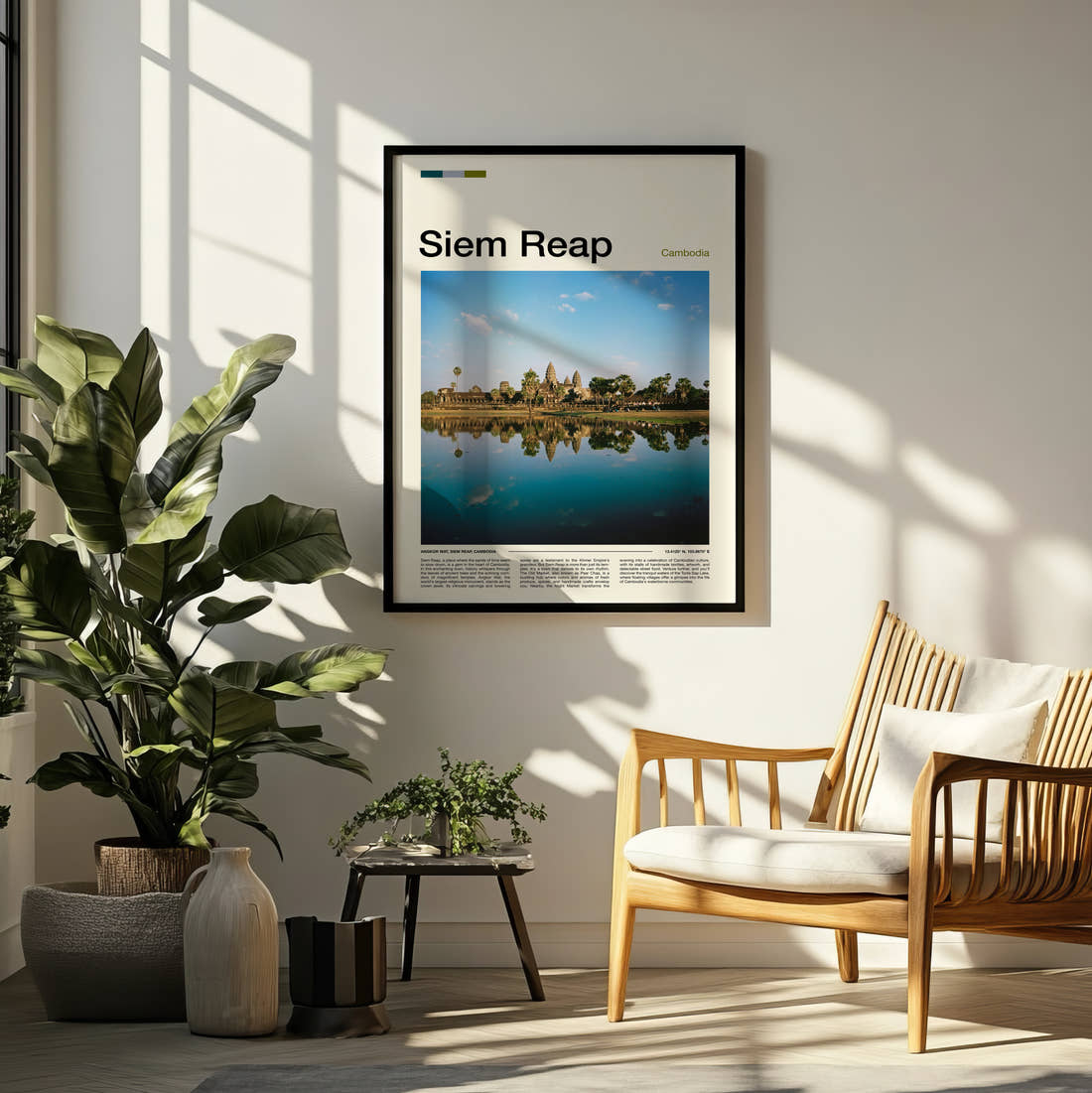 Siem Reap Angkor Wat Reflection Travel Print framed on a pale wall beside houseplants