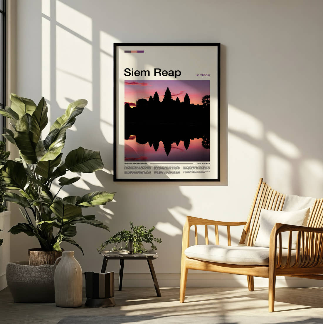 Siem Reap Temple Silhouette At Sunset Travel Print framed on a pale wall beside houseplants